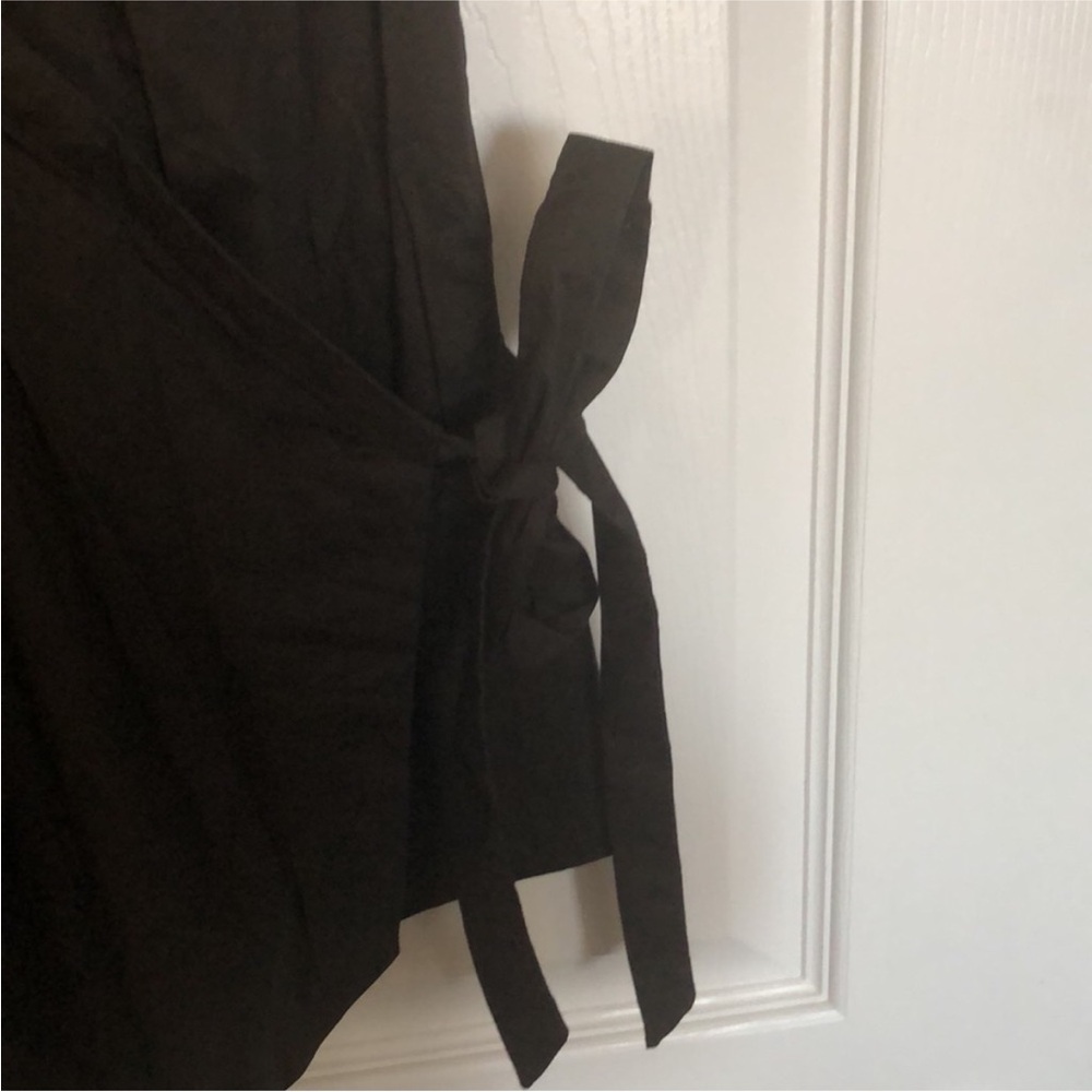 Elegant Black Wrap Blouse - Picture 2 of 8